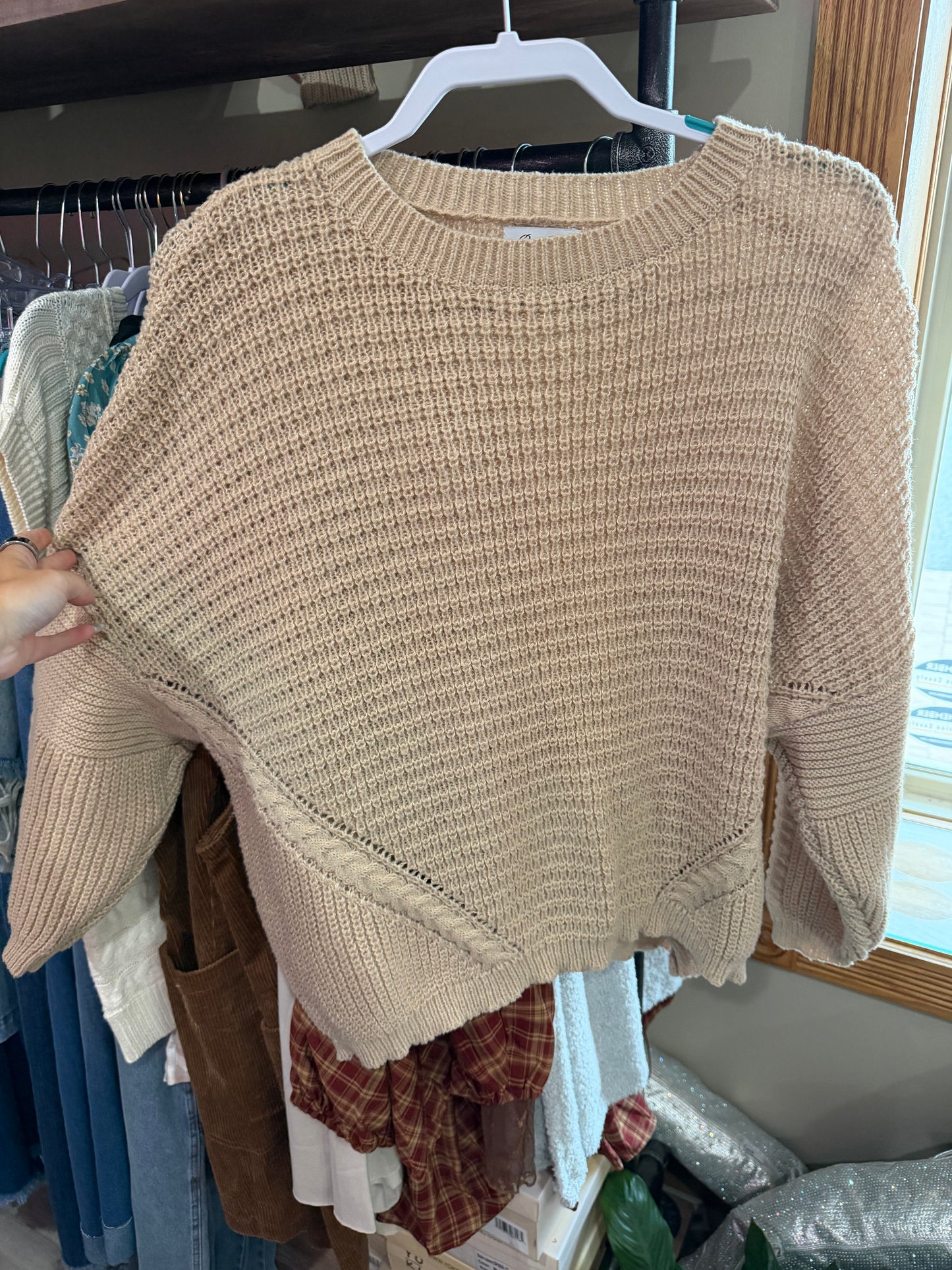 tan sweater