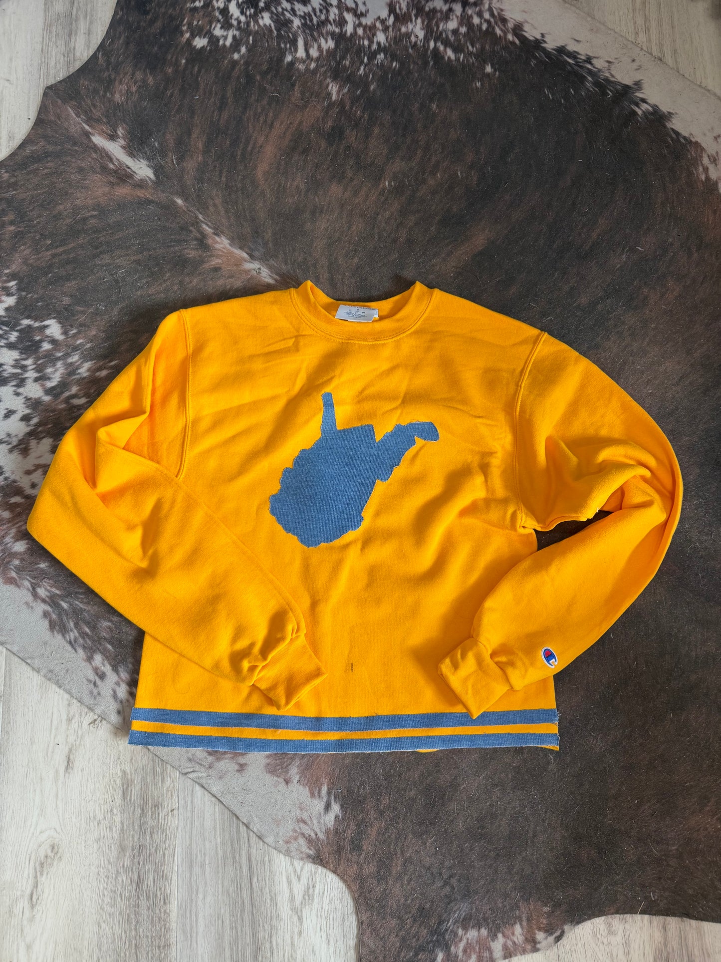 gold crew with blue jean